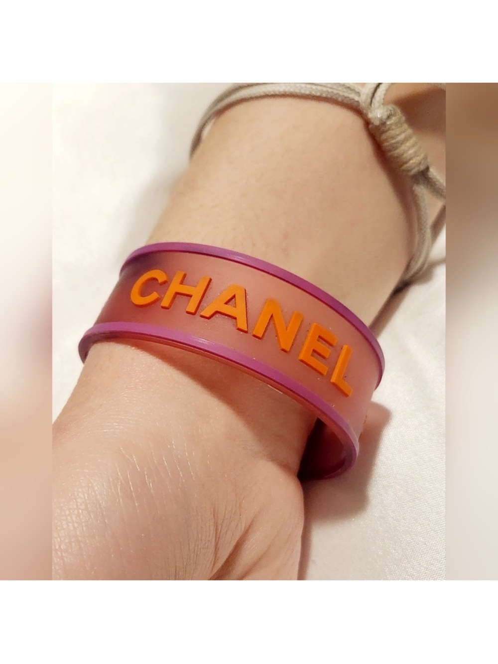 CHANEL Cuff Bracelet with Orange Logo, Pink Trim and Silver Clasp